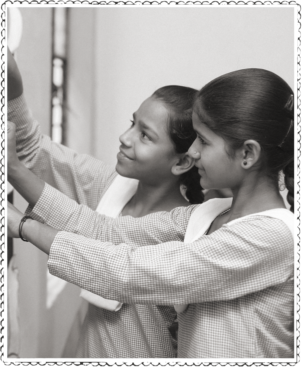 young girls playing with fabric