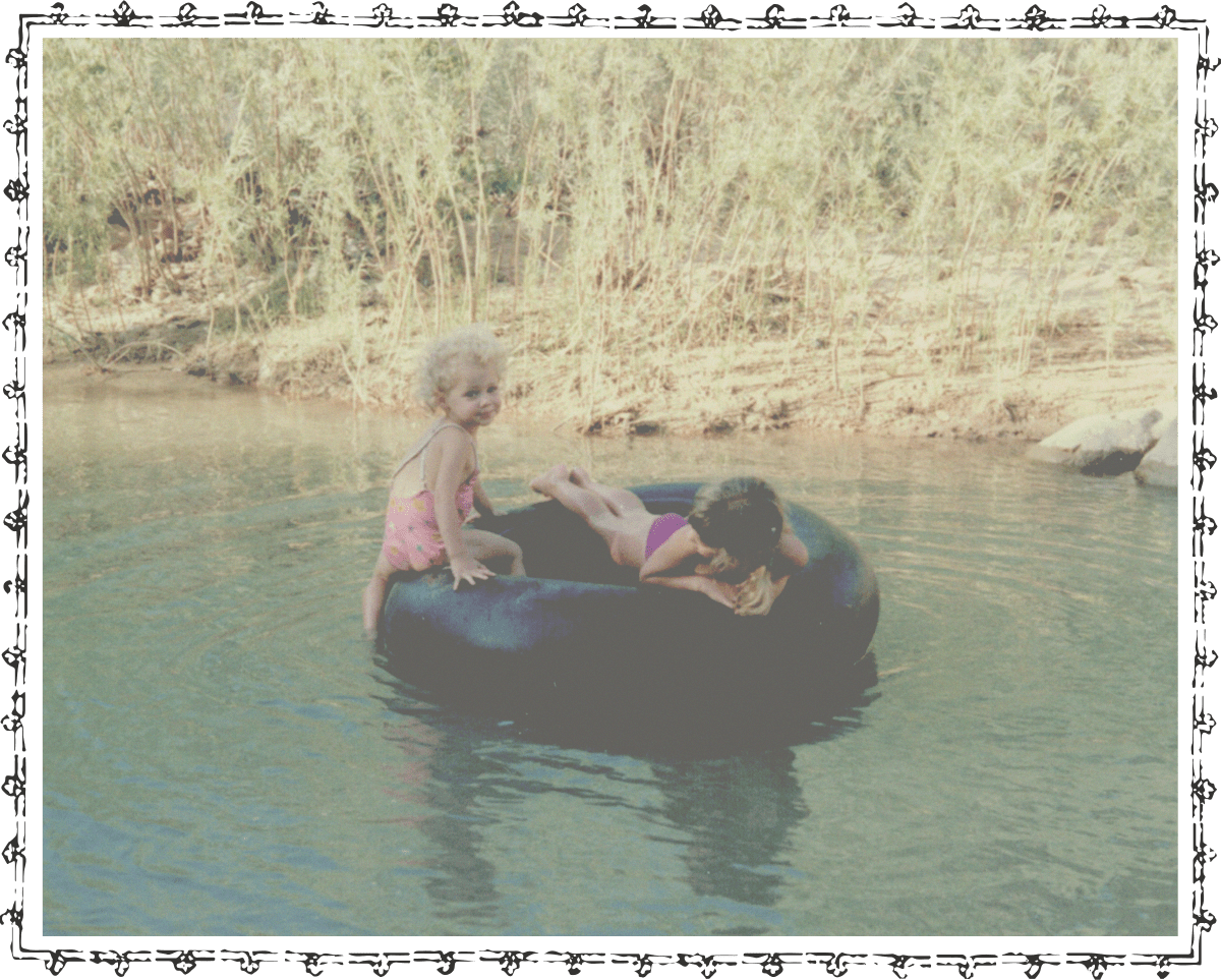 Kids in a floating tube in a river
